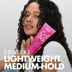 Umberto Giannini applying jelly to wet hair in shower to control frizz