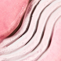 Umberto Giannini jar next to hand for size comparison and travel-friendly scale