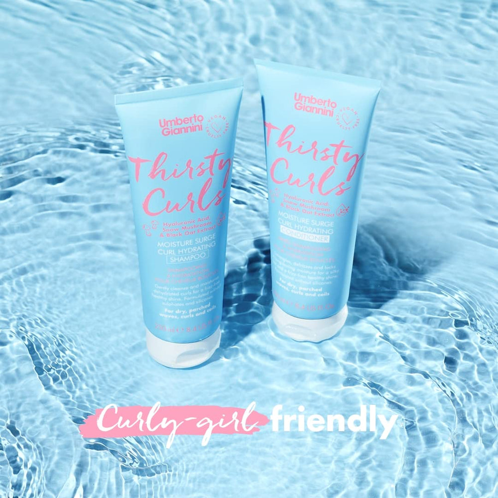 Umberto Giannini shampoo foaming in hand to show creamy lather and easy distribution