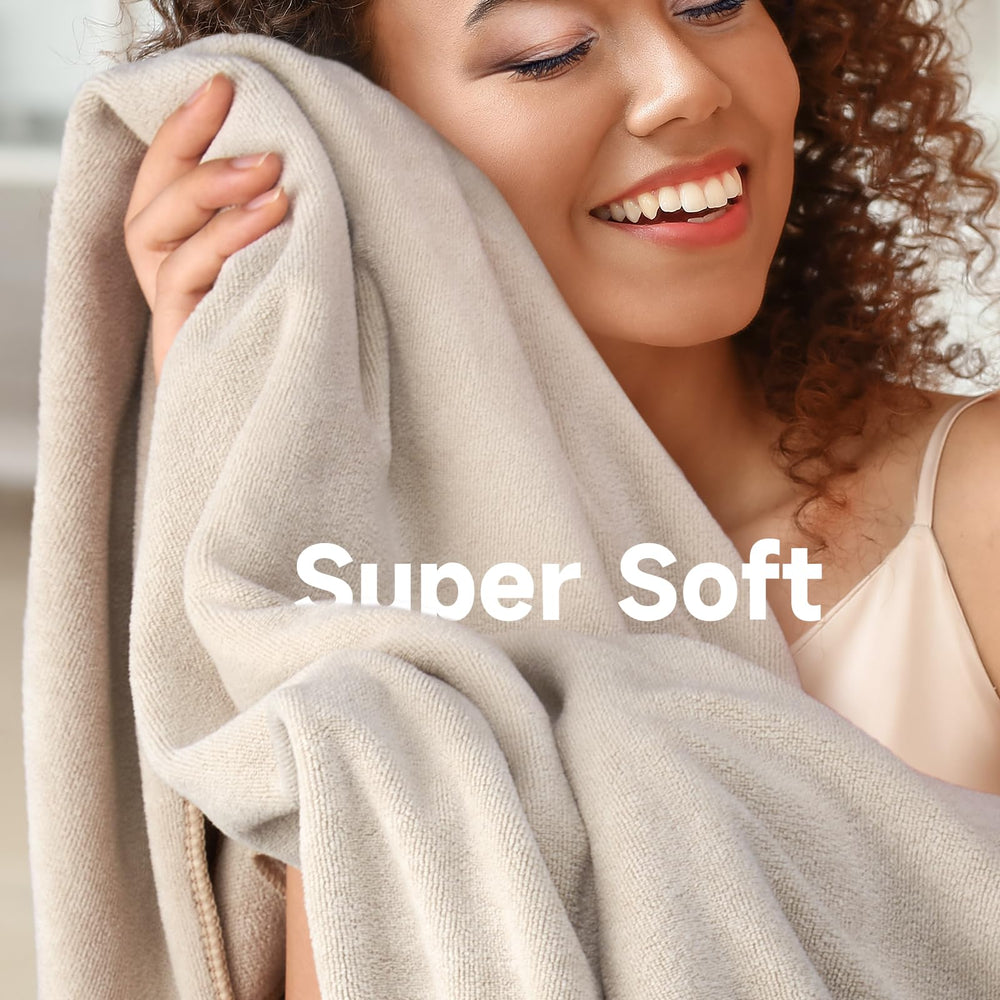 Umisleep towel beside ruler showing large size for long, thick hair
