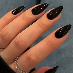 UNA GELLA front packaging showing glossy black press-on nails and kit benefits