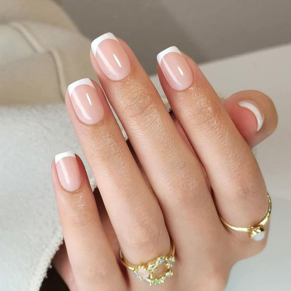 UNA GELLA front packaging showing nude-pink French tip nails and full kit benefits