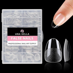 UNA GELLA trimmed and painted short almond nails shown in lifestyle setting for polished look