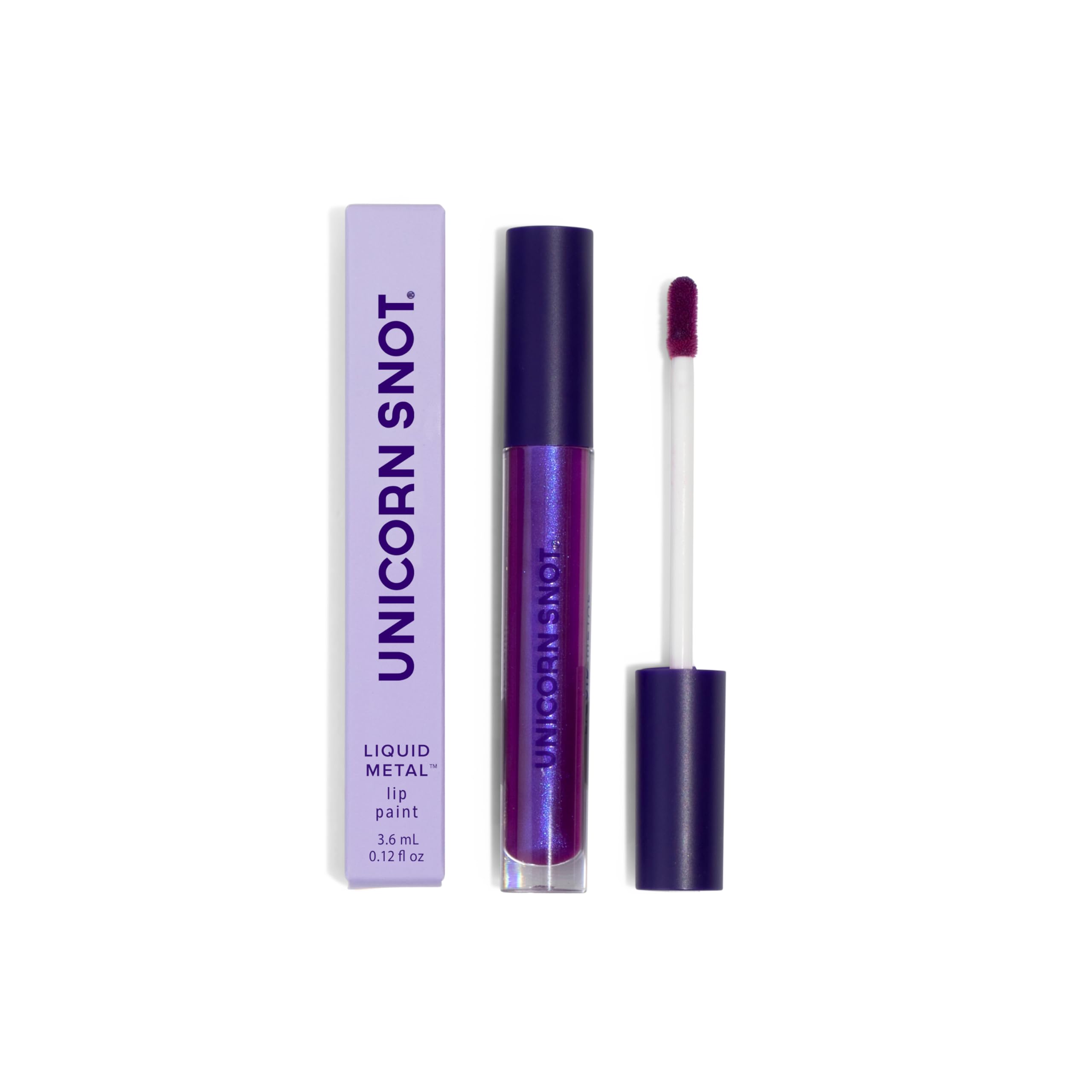 UNICORN SNOT tube next to ruler showing size and packaging details clearly