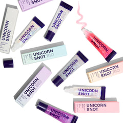 UNICORN SNOT in use on model lips demonstrating bright sparkle and plumping look