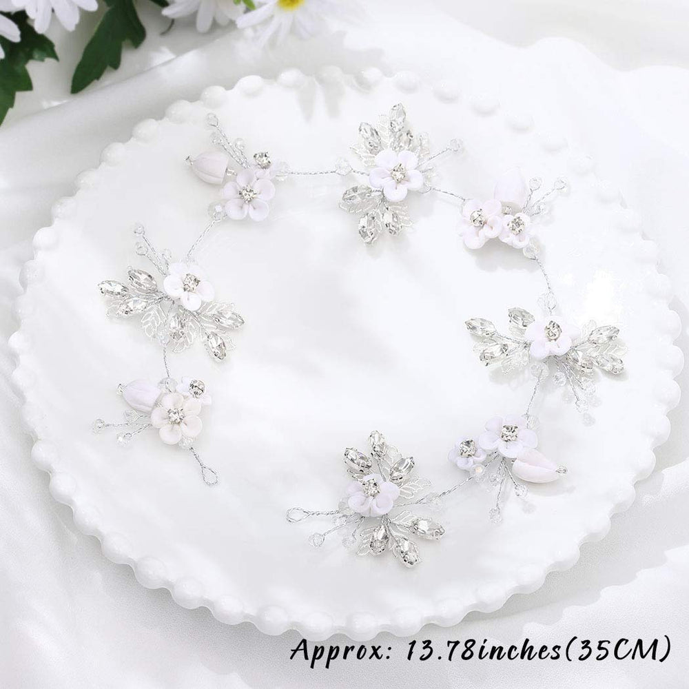 Unicra hair vine on a bride updo adding refined sparkle and finishing touch