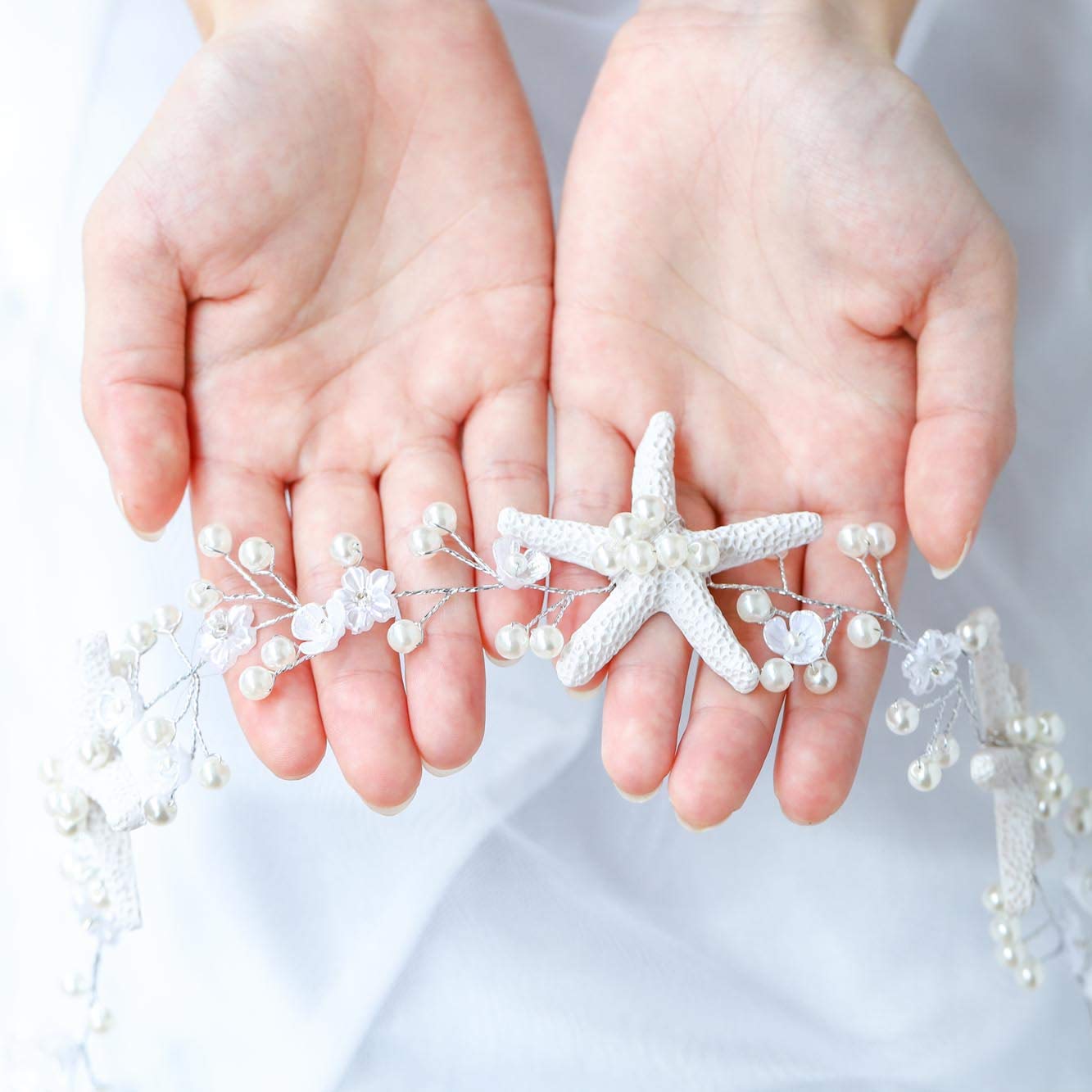 Unicra close-up showing lustrous pearls, adds delicate bridal sparkle