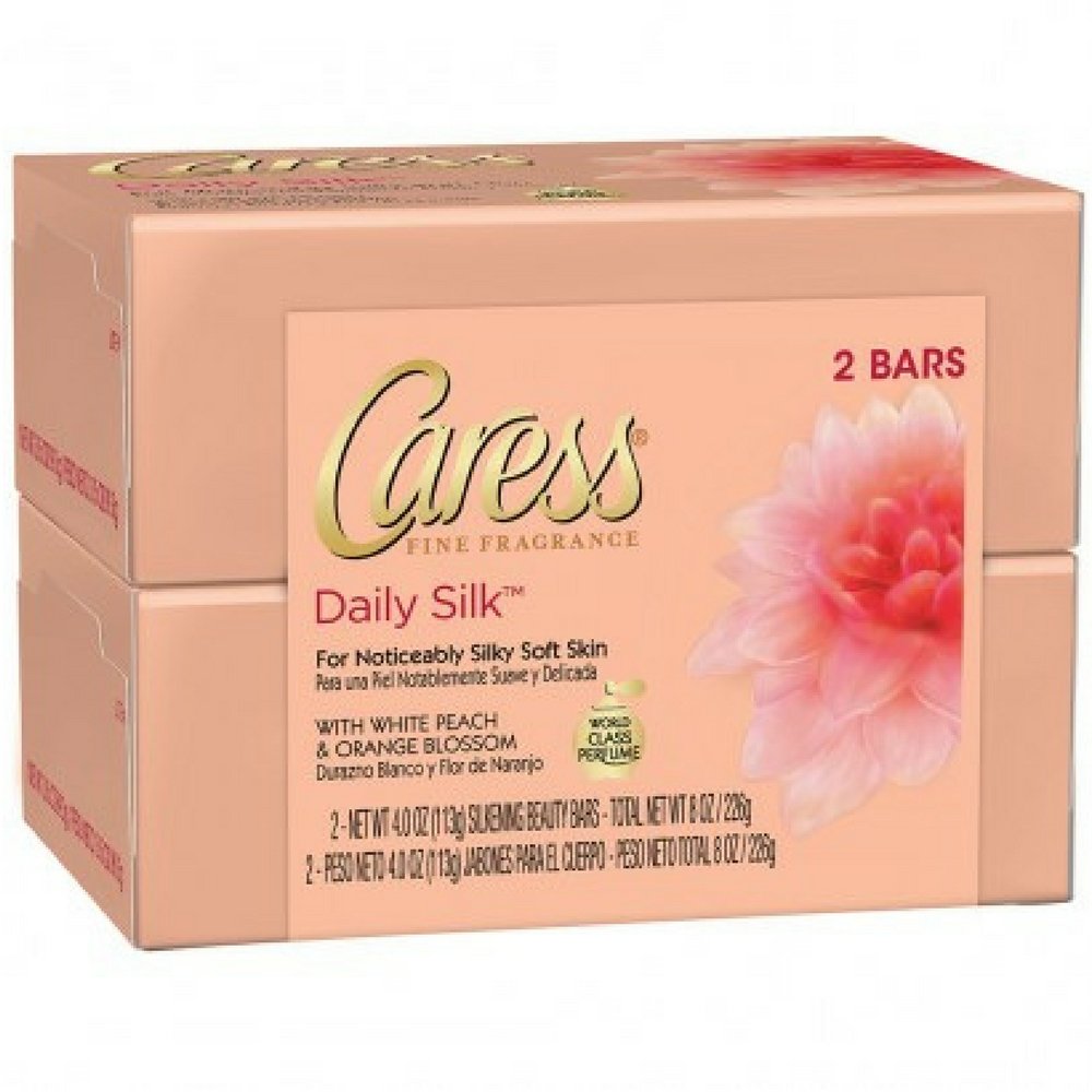 Caress Daily Silk front packaging emphasizing delicate scent and silky-soft skin benefit