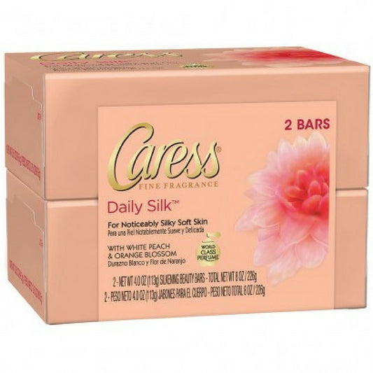 Caress Daily Silk front packaging emphasizing delicate scent and silky-soft skin benefit