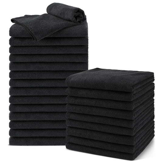 UNIMADE front pack view showing two black salon towels and packaging benefits