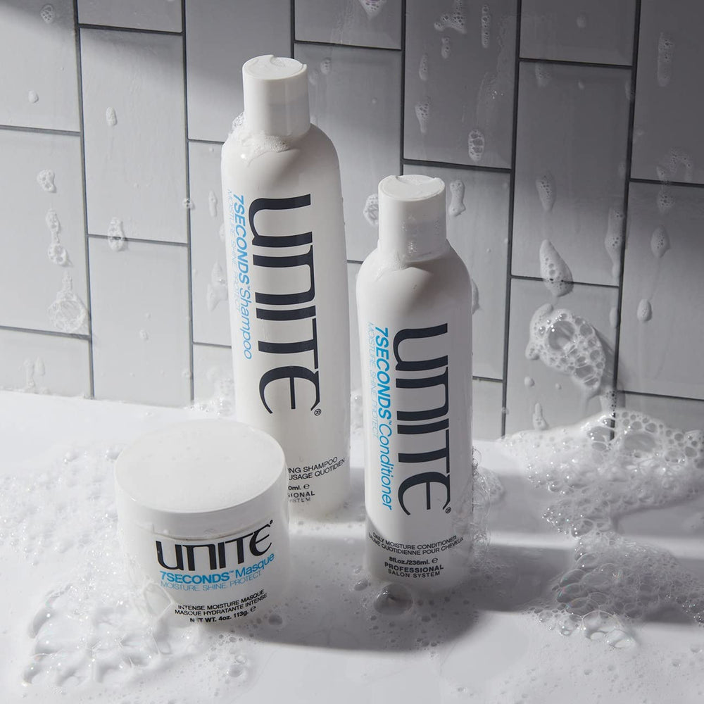 UNITE being applied to mid-lengths demonstrating detangling and manageability benefit