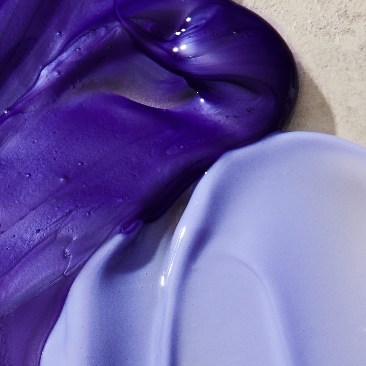 UNITE BLONDA being applied to wet hair to neutralize brass quickly