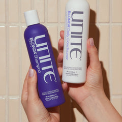 UNITE BLONDA bottle in hand demonstrating 8 fl oz travel-friendly size