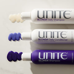 UNITE BLONDA bottle beside measuring cup to show 8oz size