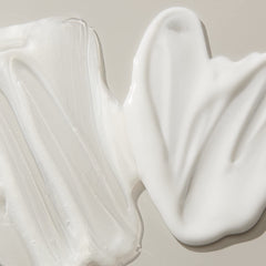 UNITE BOOSTA on bathroom shelf during styling routine demonstrating root lift benefit