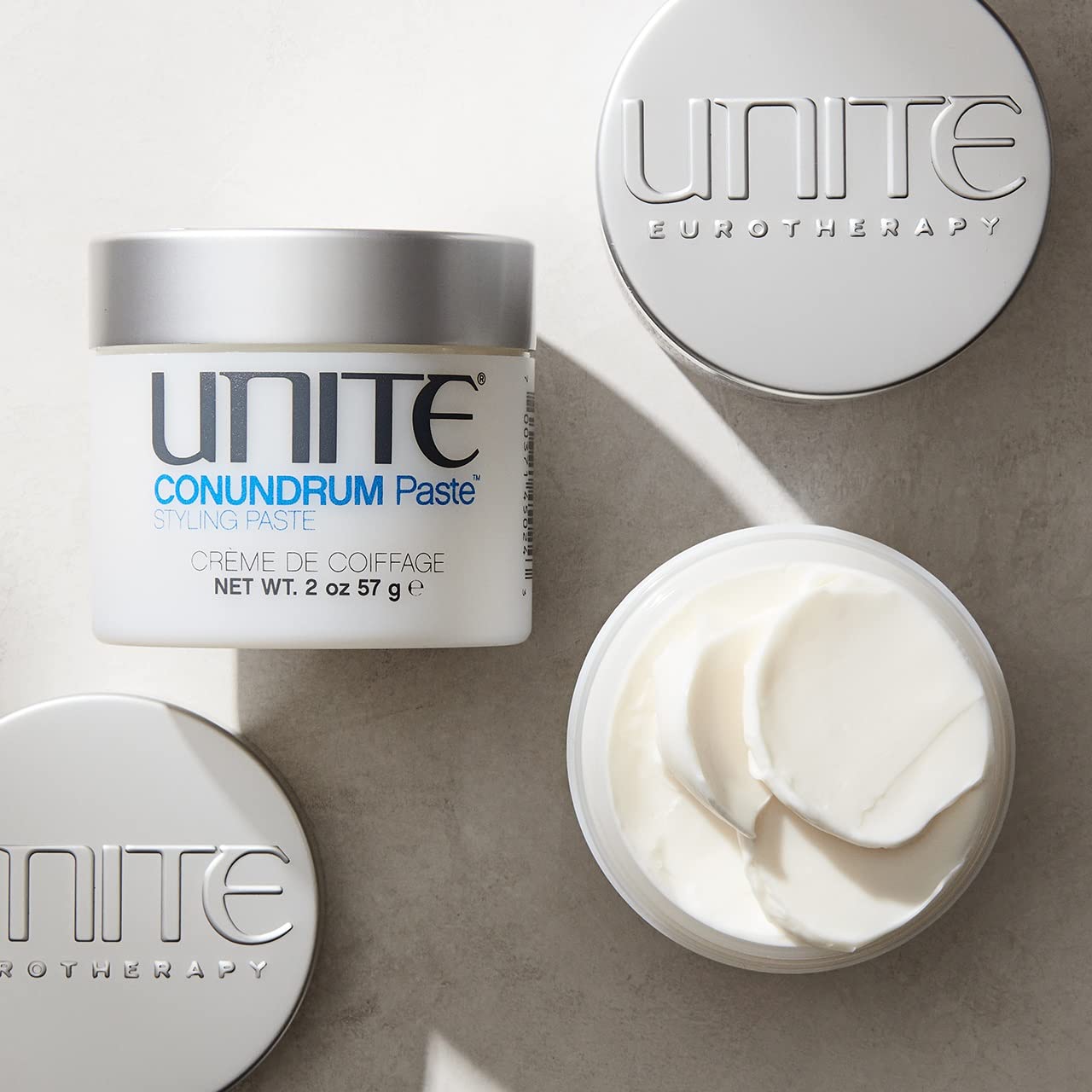 UNITE CONUNDRUM Paste creamy texture close-up showing pliable styling consistency