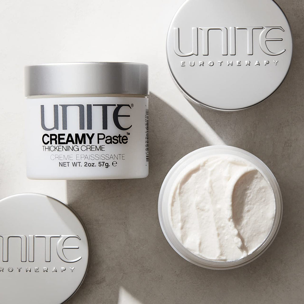 UNITE creamy paste texture closeup on fingertips demonstrating workable consistency and control