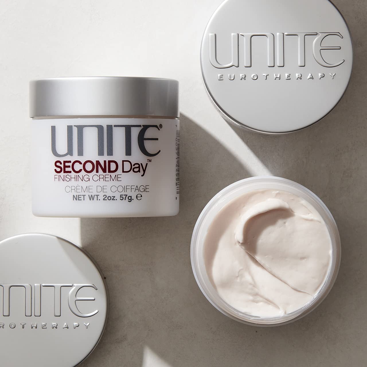 UNITE SECOND Day cream texture close-up highlighting lightweight, spreadable formula