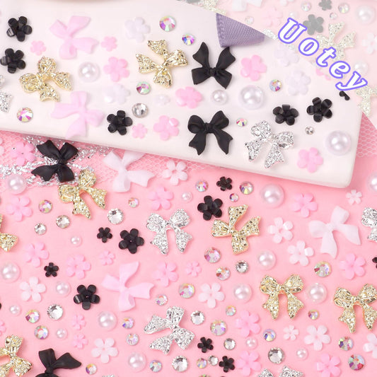 Uotey acrylic pink and black bow close-up highlighting texture and 3D effect