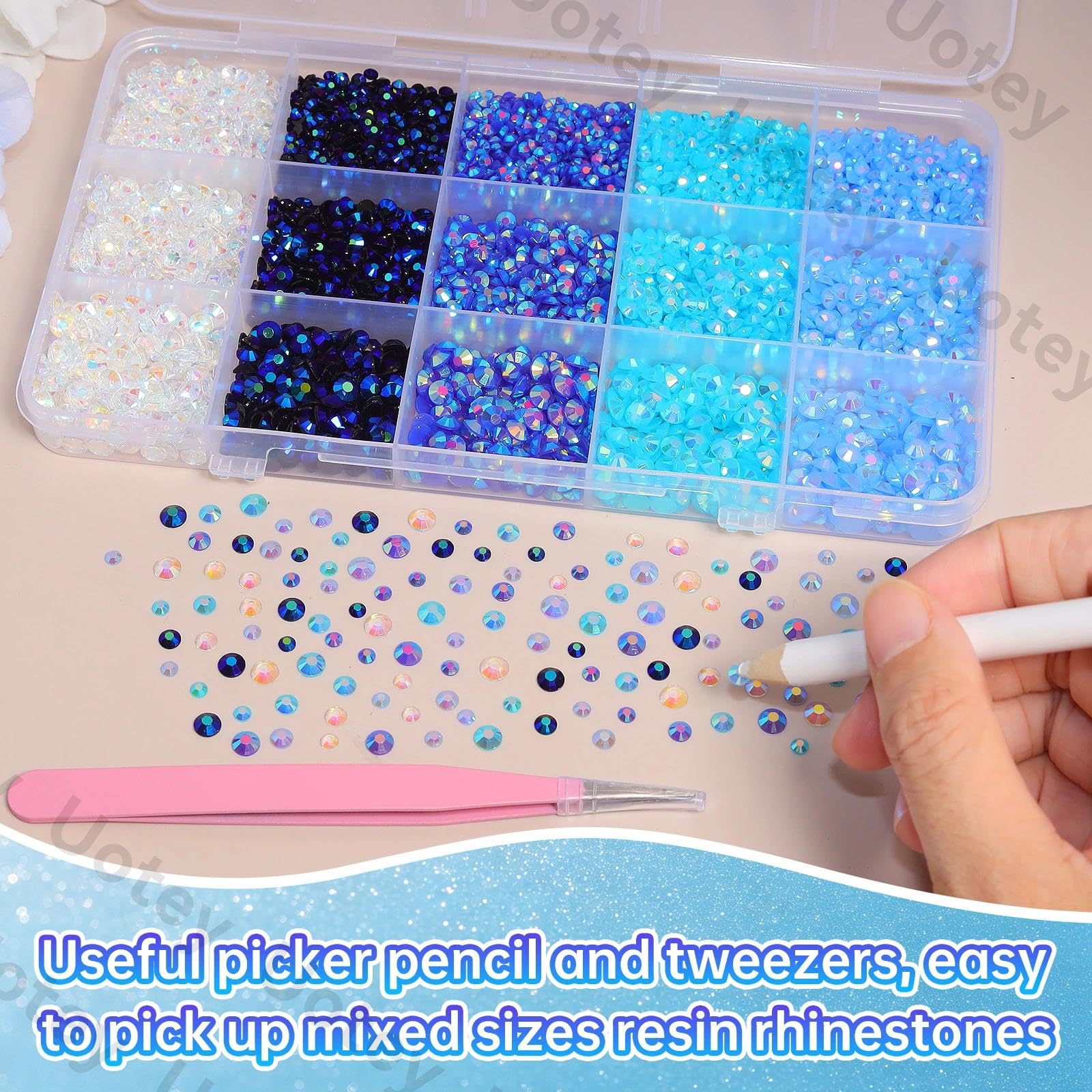 Uotey scattered blue jelly rhinestones showing iridescent AB coating and sparkle