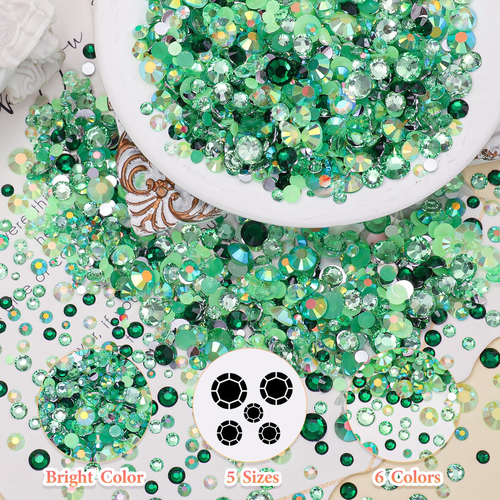 uotey rhinestones applied on nails showcasing polished green accents