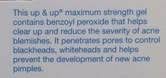 up & up travel size in hand demonstrating portable 1 oz tube ideal for on-the-go acne care and dosing control