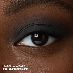 URBAN DECAY Blackout pan close-up revealing dense matte surface and smooth application benefit
