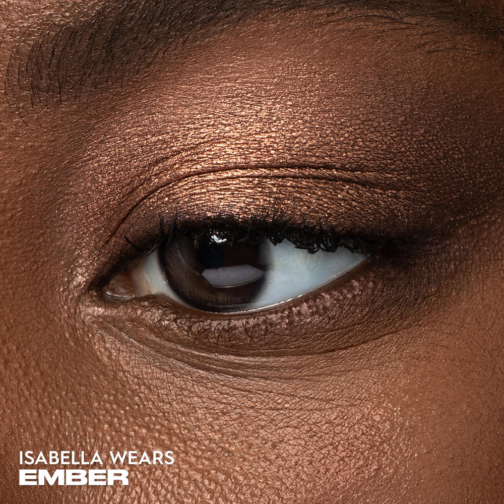 Urban Decay Ember pan close-up revealing metallic copper pigment and smooth finish