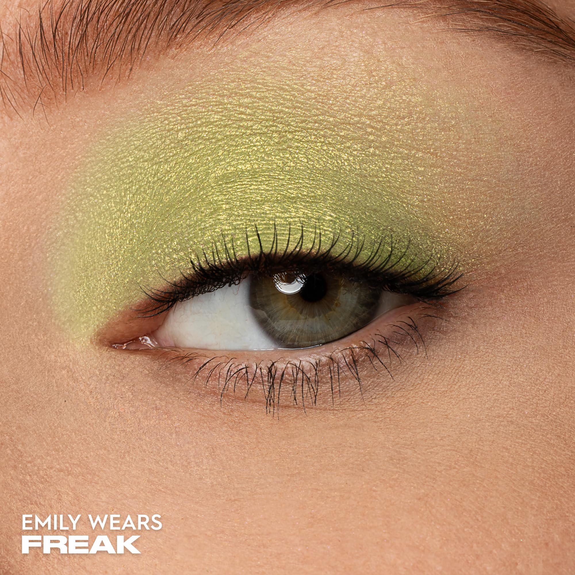 Urban Decay Freak close-up texture shot highlighting creamy shimmer payoff