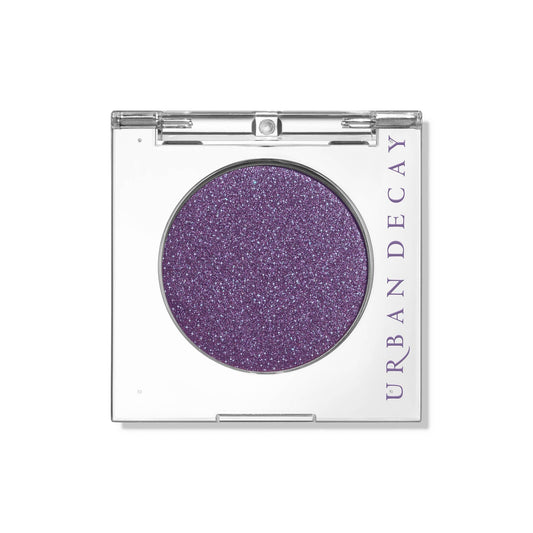 Urban Decay front compact deep purple shimmer shows product and packaging benefit vivid color