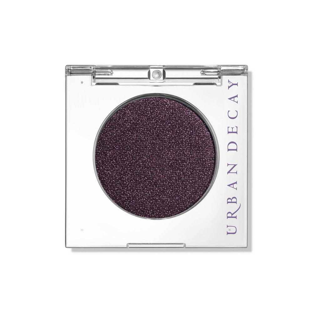 URBAN DECAY Ride front pan showing deep brown shimmer and purple shift benefit vivid pigment