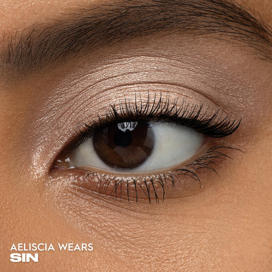 URBAN DECAY Sin close-up of pan texture revealing smooth, blendable finish benefit for seamless application