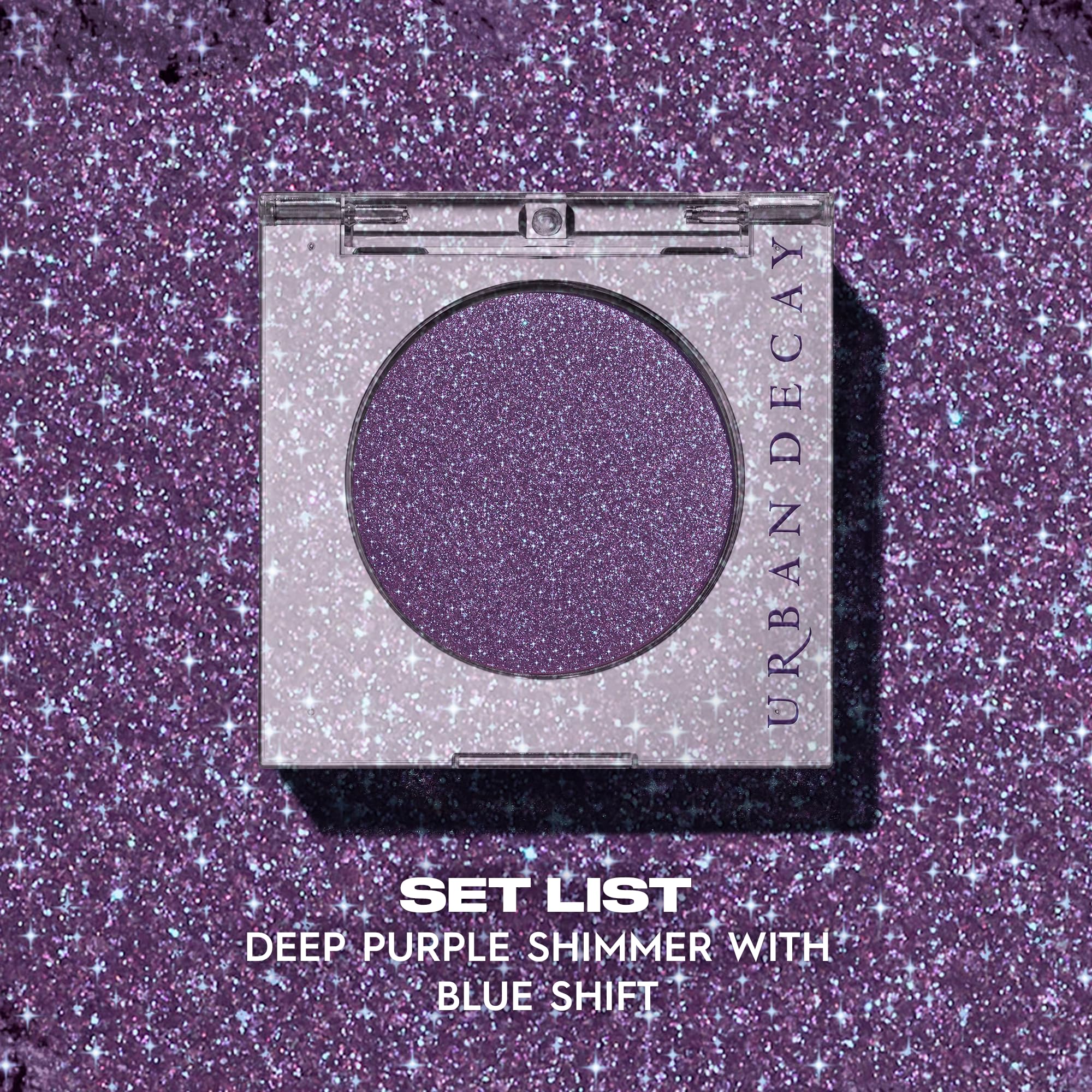 Urban Decay swatch on skin showing deep purple with blue shift for dimensional color