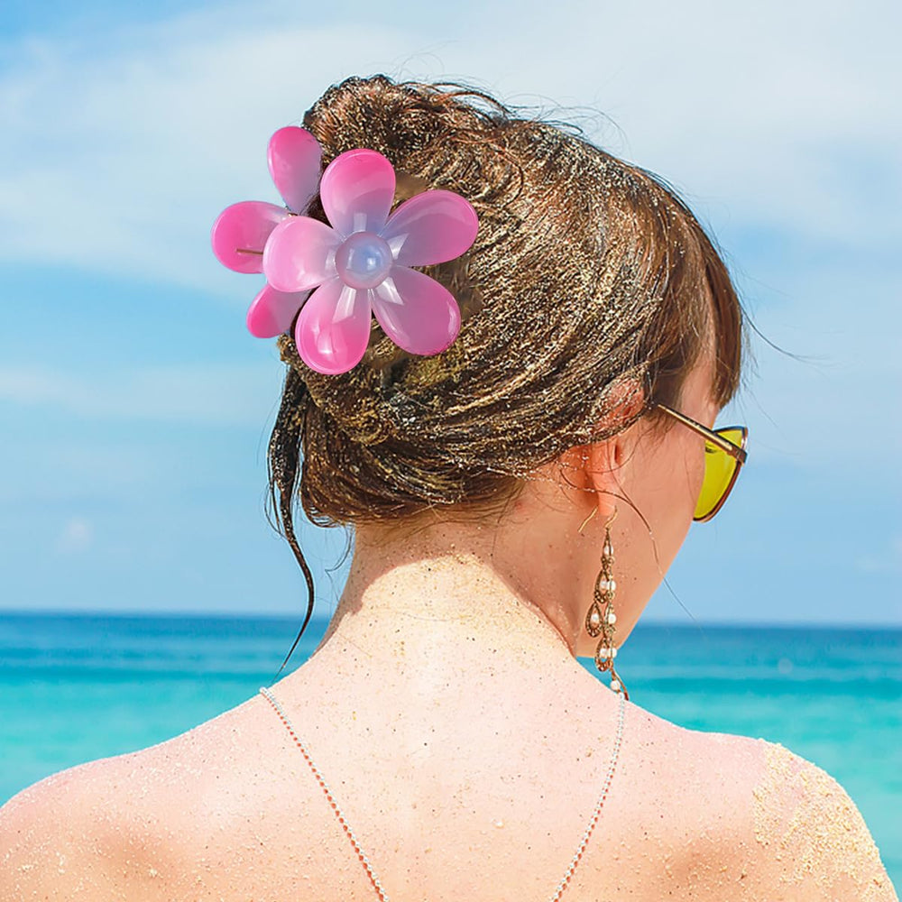 urryKid half-up hairstyle using flower clip for secure, decorative hold