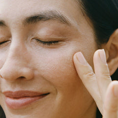 Ursa Major small dab on hand demonstrating amount and lightweight absorbency benefit