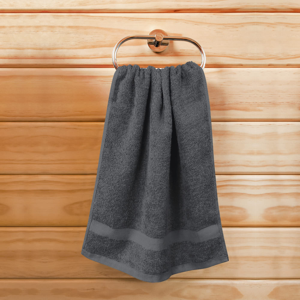 Utopia Towels label and fabric tag revealing 100% cotton information for care clarity