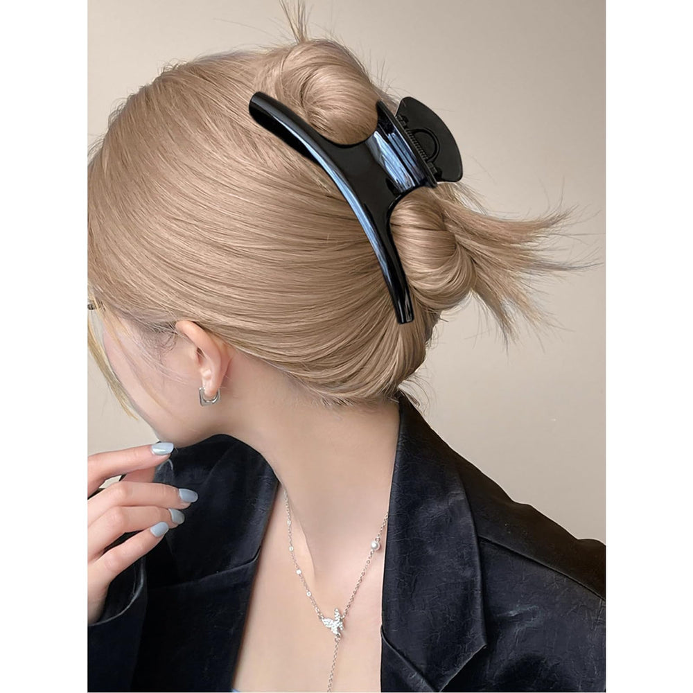 UVANKAUP securing a half-up style to show versatility and easy everyday styling