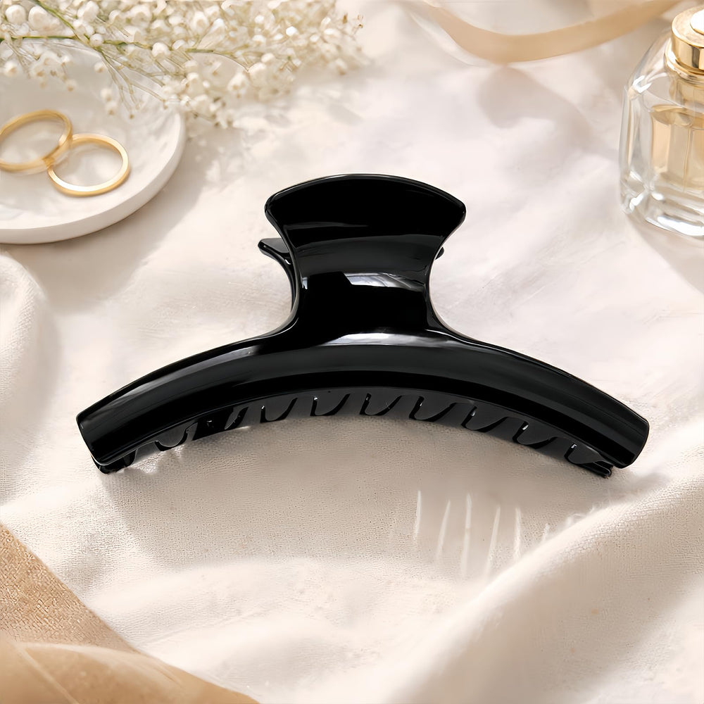 UVANKAUP in a casual desk setting suggesting stylish, office-friendly hair control
