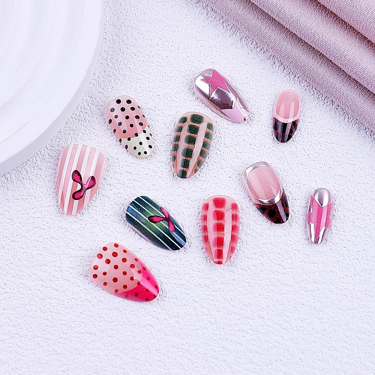 UZJXQ model pressing a medium almond nail on demonstrating fast, secure application
