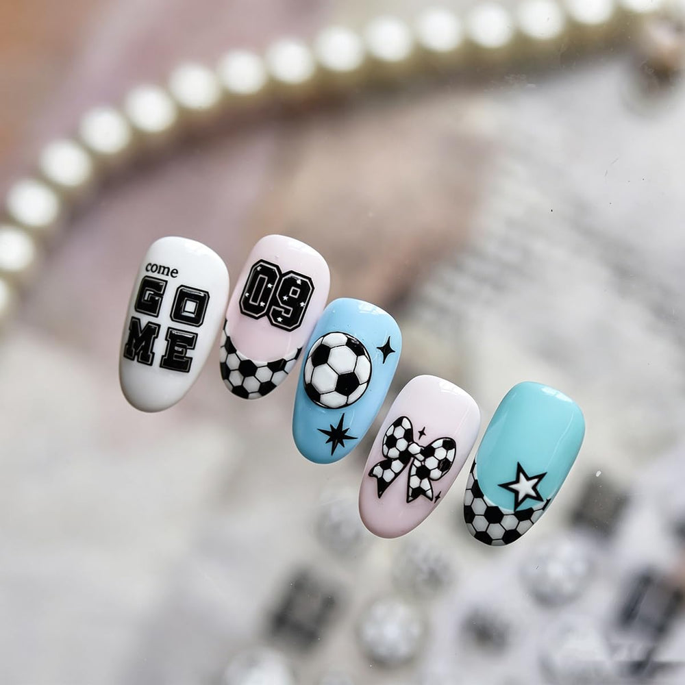 UZJXQ black and white stickers applied on nails showing striking contrast benefit