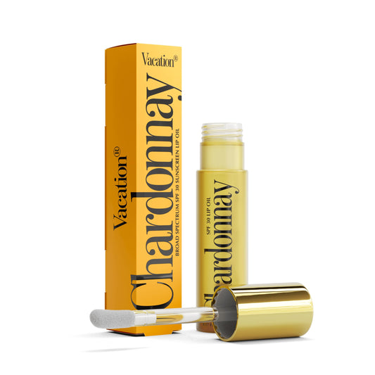 VACATION Chardonnay lip oil front tube showing compact SPF 30 protection and gloss