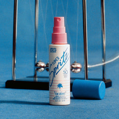 VACATION mist over makeup demonstrating compatibility and non-disruptive finish