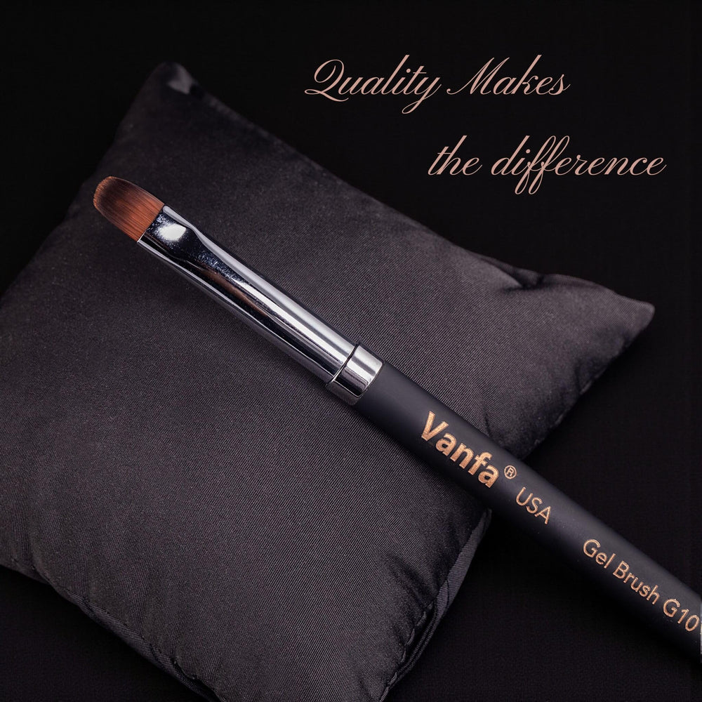 Vanfa brush beside coin showing size and travel-friendly portability