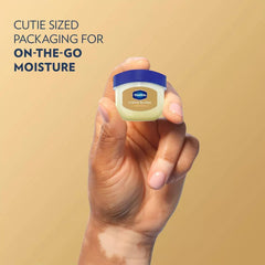 Vaseline Cocoa Butter mini jar open showing creamy balm texture