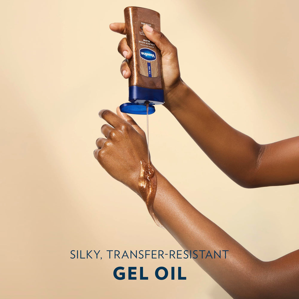 Vaseline bottle held in hand to show true scale and easy travel-friendly benefit
