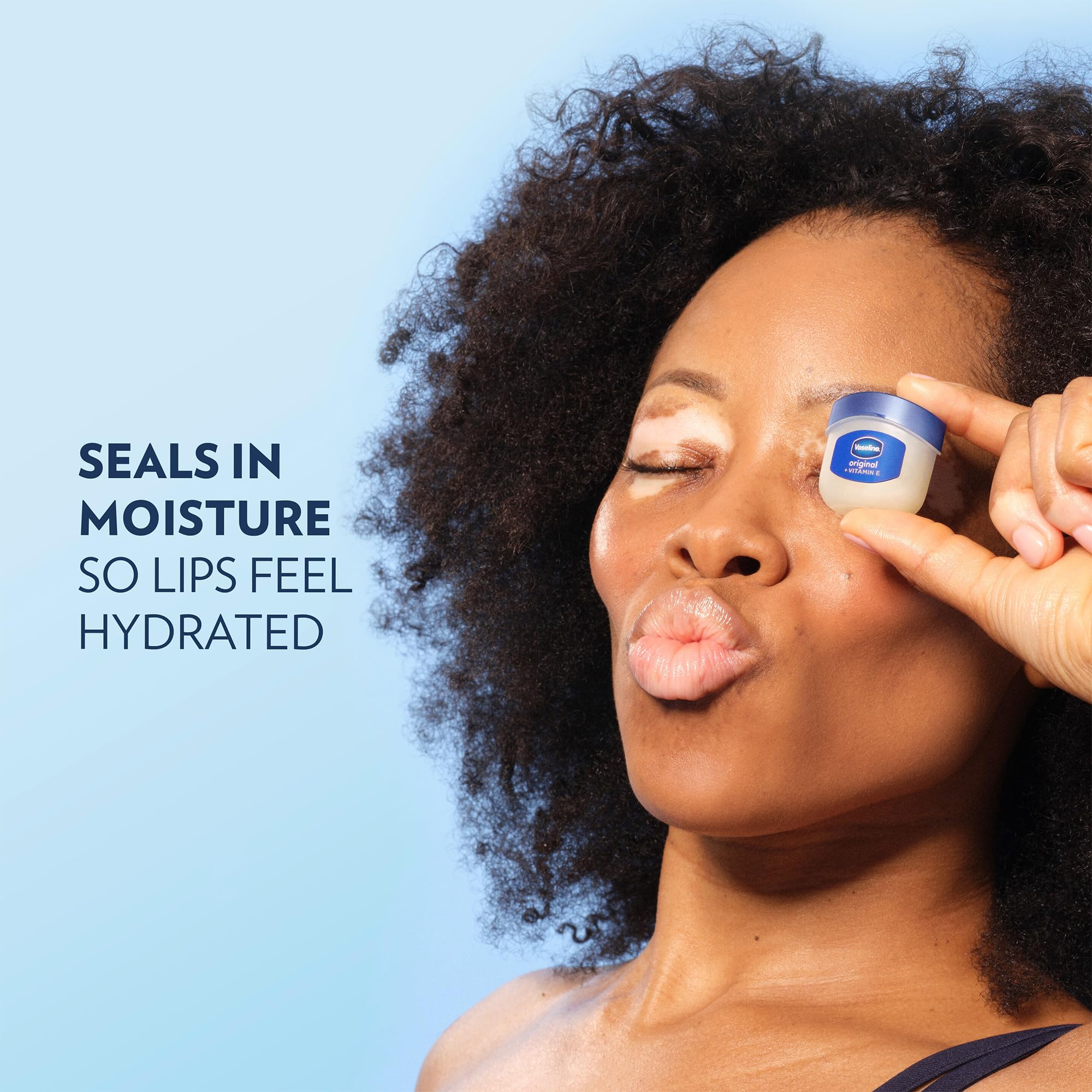 Vaseline jar inside a purse illustrating on-the-go lip care