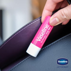 Two open Vaseline tins showing Original and Rosy textures for quick use