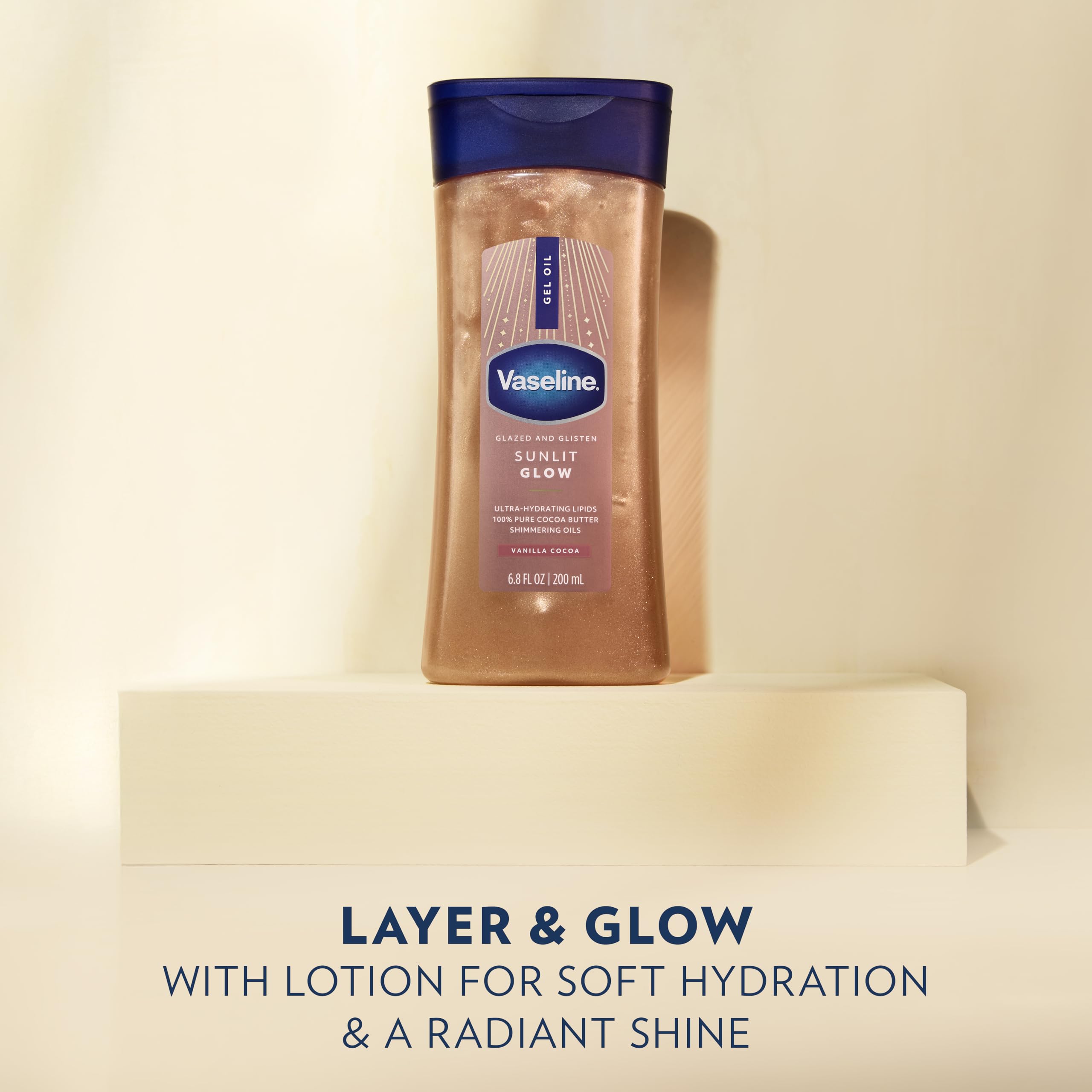 Vaseline applied to shoulders and collarbones creating subtle shine