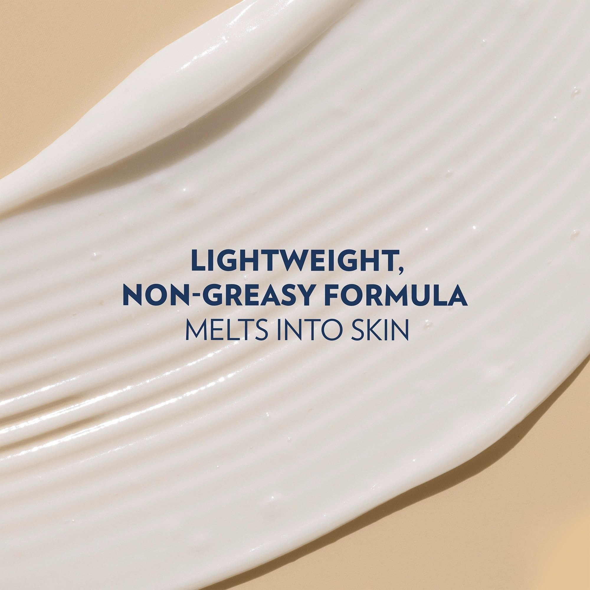 Hand holding Vaseline almond smooth to show real size and travel readiness