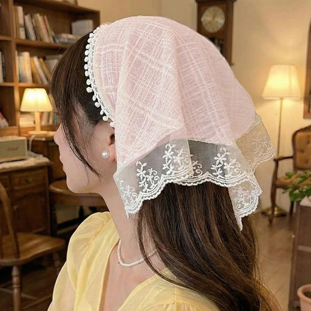 VASTRISE closeup of white lace trim highlighting delicate ribbon detail and elegance
